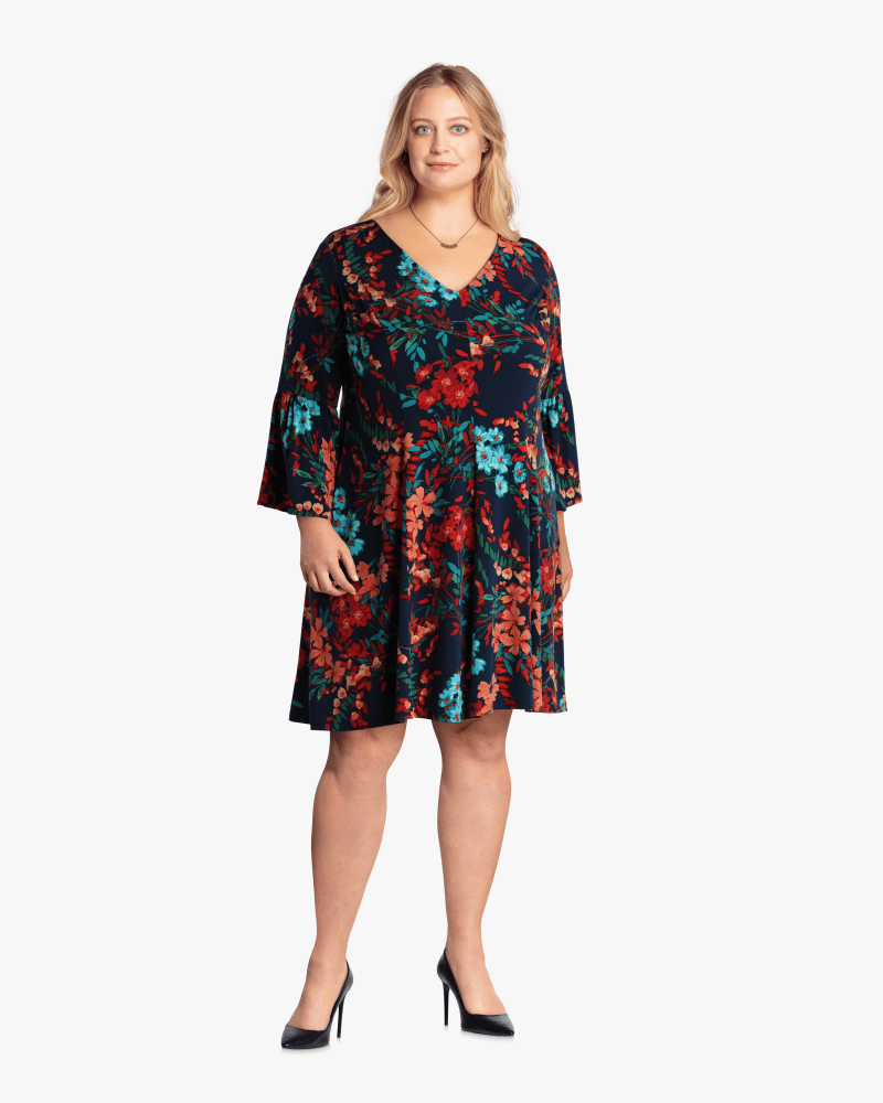 Plus size model with hourglass body shape wearing Kentia Flared Sleeve Dress by Sabrina Blue | Dia&Co | dia_product_style_image_id:113593